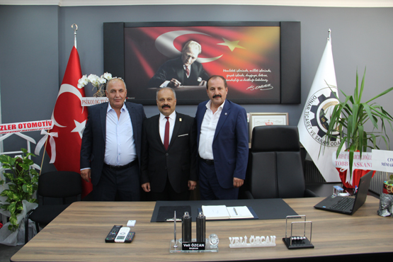 VELİ ÖZCAN MAZBATAYI ALDI