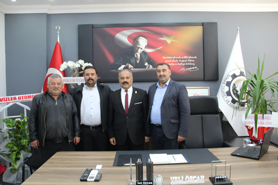 VELİ ÖZCAN MAZBATAYI ALDI